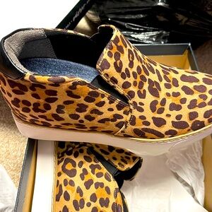 Leopard print wedge tennis shoes.